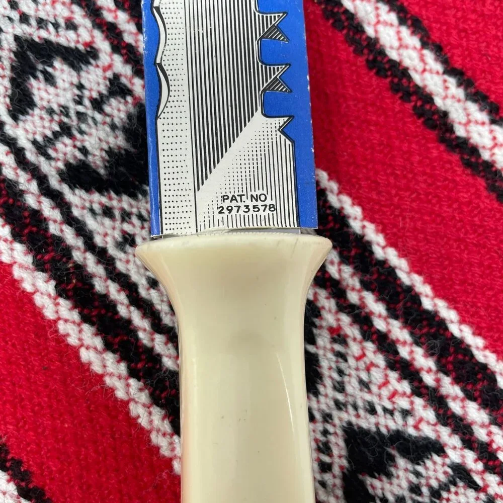 Vintage Quikut Slicing Knife Crosscut Edge Ivory Handle Stainless Steel Made USA